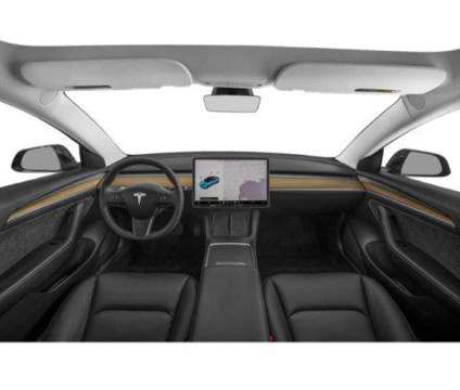 2021 Tesla Model 3 Standard Range Plus Rear-Wheel Drive is a Black 2021 Tesla Model 3 Car for Sale in Burnsville MN