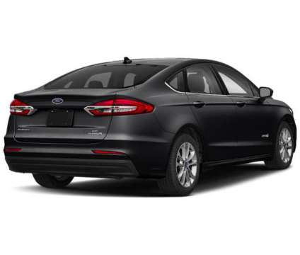 2019 Ford Fusion Hybrid SE is a Black 2019 Ford Fusion Hybrid SE Hybrid in Logan UT