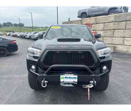 2016 Toyota Tacoma TRD Sport is a Black 2016 Toyota Tacoma TRD Sport Truck in Dubuque IA