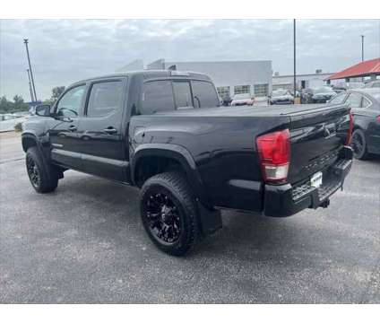 2016 Toyota Tacoma TRD Sport is a Black 2016 Toyota Tacoma TRD Sport Truck in Dubuque IA