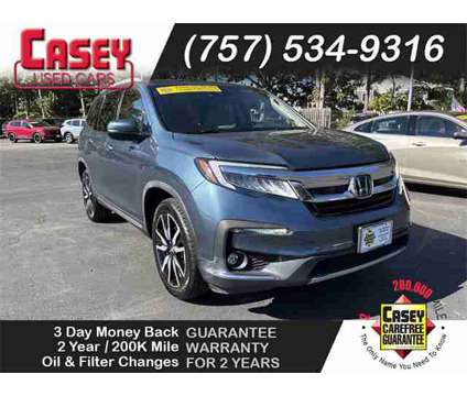 2021 Honda Pilot Touring 7 Passenger is a Blue 2021 Honda Pilot Touring SUV in Newport News VA