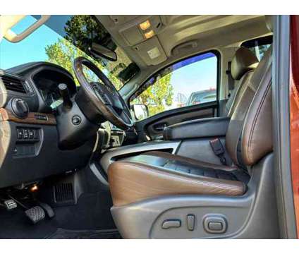 2017 Nissan Titan Platinum Reserve is a Gold 2017 Nissan Titan Platinum Reserve Truck in Thousand Oaks CA