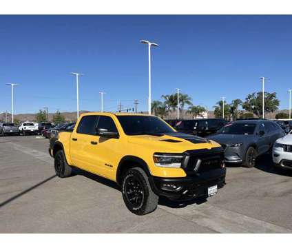 2023 Ram 1500 Rebel is a Yellow 2023 RAM 1500 Model Rebel Truck in Hemet CA