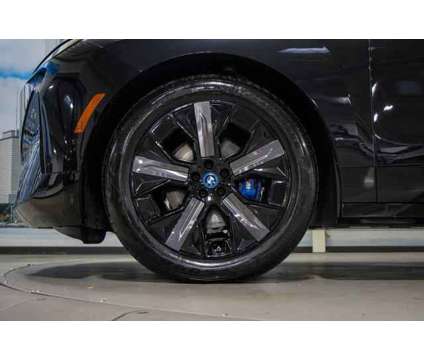 2024 BMW iX M60 is a Black 2024 BMW 325 Model iX SUV in Lake Bluff IL