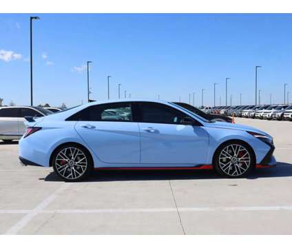 2023 Hyundai Elantra N Base is a Blue 2023 Hyundai Elantra Sedan in Friendswood TX