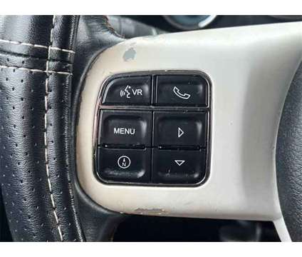 2012 Jeep Wrangler Unlimited Arctic is a Silver 2012 Jeep Wrangler Unlimited Car for Sale in Howell MI