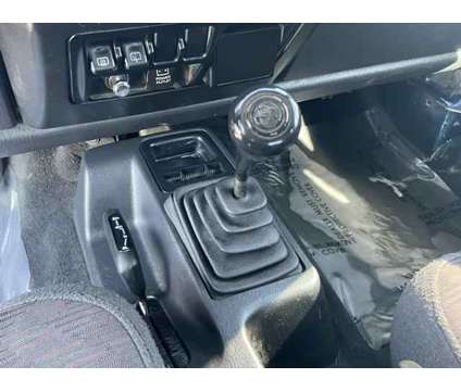 2004 Jeep Wrangler Sport is a Black, Blue 2004 Jeep Wrangler Sport SUV in Woods Cross UT