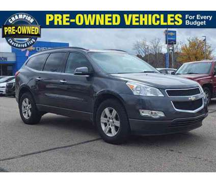 2011 Chevrolet Traverse LT w/1LT is a Grey 2011 Chevrolet Traverse LT Car for Sale in Howell MI