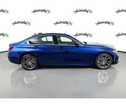 2022 BMW 3 Series xDrive is a Blue 2022 BMW 3-Series Sedan in Huntington Station NY