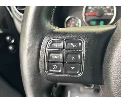 2015 Jeep Wrangler Unlimited Sport is a Black 2015 Jeep Wrangler Unlimited Sport SUV in Fort Lauderdale FL