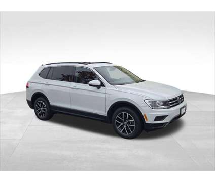 2021 Volkswagen Tiguan 2.0T SE is a White 2021 Volkswagen Tiguan 2.0T SUV in Naperville IL