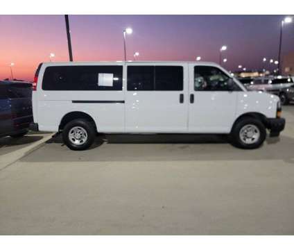 2023 Chevrolet Express Passenger LS is a White 2023 Chevrolet Express Van in Friendswood TX