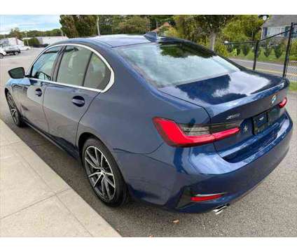 2021 BMW 3 Series xDrive is a Blue 2021 BMW 3-Series Sedan in Hyannis MA