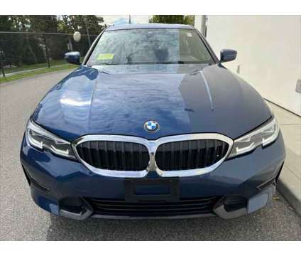 2021 BMW 3 Series xDrive is a Blue 2021 BMW 3-Series Sedan in Hyannis MA