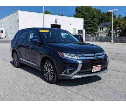 2018 Mitsubishi Outlander SE is a Blue 2018 Mitsubishi Outlander SE SUV in Catonsville MD