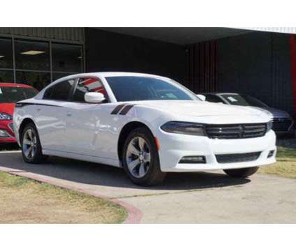 2016 Dodge Charger SXT is a White 2016 Dodge Charger SXT Sedan in Arlington TX