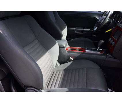 2013 Dodge Challenger SXT is a White 2013 Dodge Challenger SXT Coupe in Arlington TX