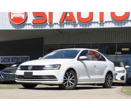 2017 Volkswagen Jetta 1.4T SE is a Silver, White 2017 Volkswagen Jetta 1.4T SE Sedan in Arlington TX