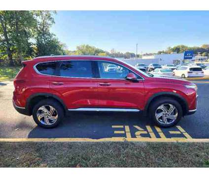 2021 Hyundai Santa Fe SEL is a Red 2021 Hyundai Santa Fe SUV in Freehold NJ