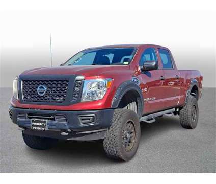 2017 Nissan Titan XD S is a Red 2017 Nissan Titan XD S Truck in Springfield VA