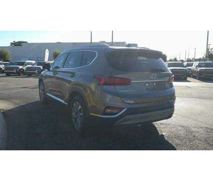 2020 Hyundai Santa Fe SEL is a Tan 2020 Hyundai Santa Fe SUV in Winter Haven FL