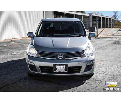 2009 Nissan Versa 1.8 S is a Grey 2009 Nissan Versa 1.8 S Hatchback in Mokena IL