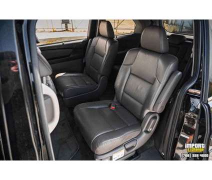 2016 Honda Odyssey Touring Minivan 4D is a Black 2016 Honda Odyssey Touring Car for Sale in Mokena IL