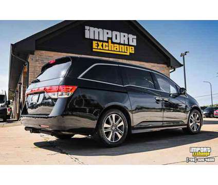 2016 Honda Odyssey Touring Minivan 4D is a Black 2016 Honda Odyssey Touring Car for Sale in Mokena IL