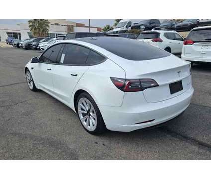 2022 Tesla Model 3 Long Range Dual Motor All-Wheel Drive is a White 2022 Tesla Model 3 Long Range Sedan in Saint George UT