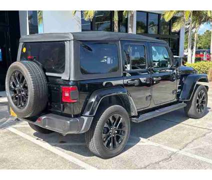 2021 Jeep Wrangler 4xe Unlimited Sahara is a White 2021 Jeep Wrangler SUV in Vero Beach FL