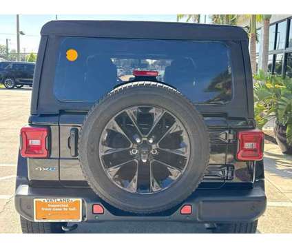 2021 Jeep Wrangler 4xe Unlimited Sahara is a White 2021 Jeep Wrangler SUV in Vero Beach FL