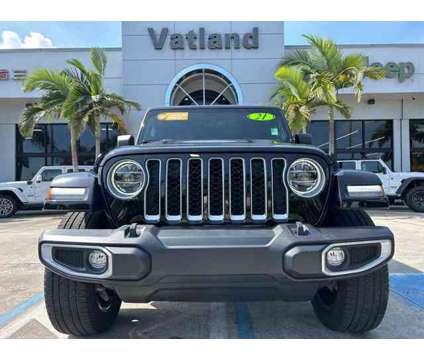 2021 Jeep Wrangler 4xe Unlimited Sahara is a Black 2021 Jeep Wrangler SUV in Vero Beach FL