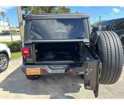 2021 Jeep Wrangler 4xe Unlimited Sahara is a Black 2021 Jeep Wrangler SUV in Vero Beach FL