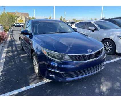 2018 Kia Optima LX is a Blue 2018 Kia Optima LX Sedan in Woods Cross UT