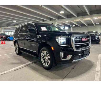 2021 GMC Yukon SLT is a Black 2021 GMC Yukon SLT SUV in Hialeah FL