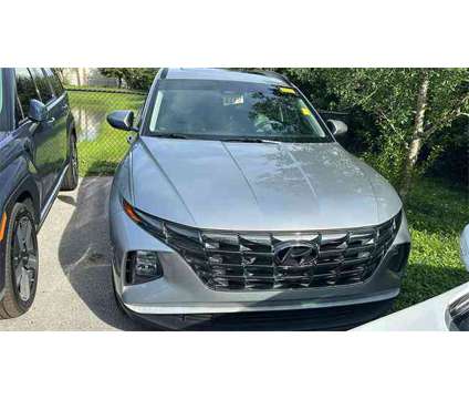 2022 Hyundai Tucson SEL is a Silver 2022 Hyundai Tucson SUV in Vero Beach FL