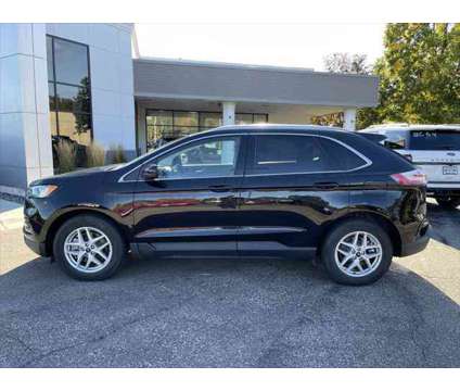 2022 Ford Edge SEL is a Black 2022 Ford Edge SEL SUV in Stevens Point WI