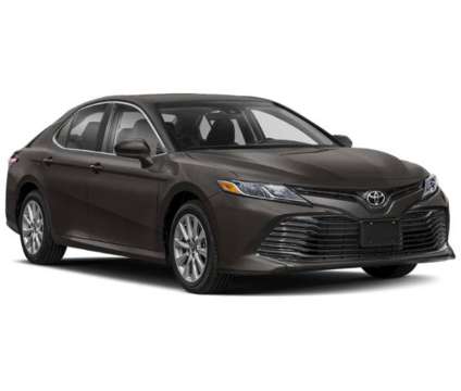 2020 Toyota Camry LE is a White 2020 Toyota Camry LE Sedan in Tupelo MS