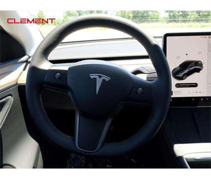 2024 Tesla Model Y Long Range Dual Motor All-Wheel Drive is a 2024 Station Wagon in Wentzville MO