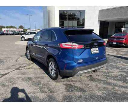 2021 Ford Edge SEL is a Blue 2021 Ford Edge SEL SUV in Stevens Point WI