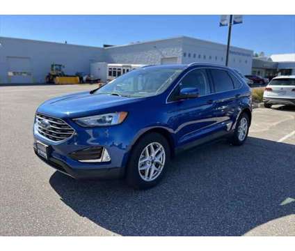 2021 Ford Edge SEL is a Blue 2021 Ford Edge SEL SUV in Stevens Point WI