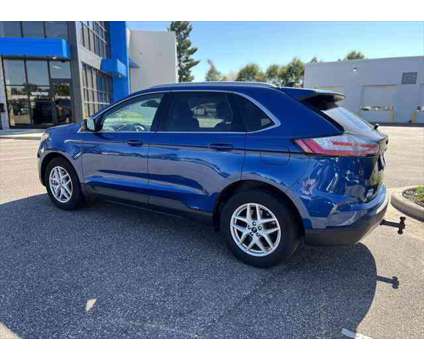 2021 Ford Edge SEL is a Blue 2021 Ford Edge SEL SUV in Stevens Point WI