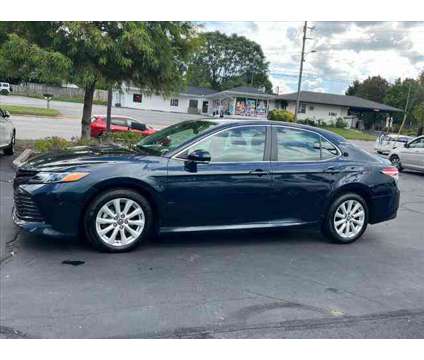 2019 Toyota Camry LE is a Blue 2019 Toyota Camry LE Car for Sale in Asheville NC