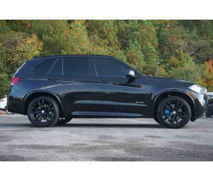 2018 BMW X5 xDrive50i is a Black 2018 BMW X5 xDrive50i SUV in Pelham AL